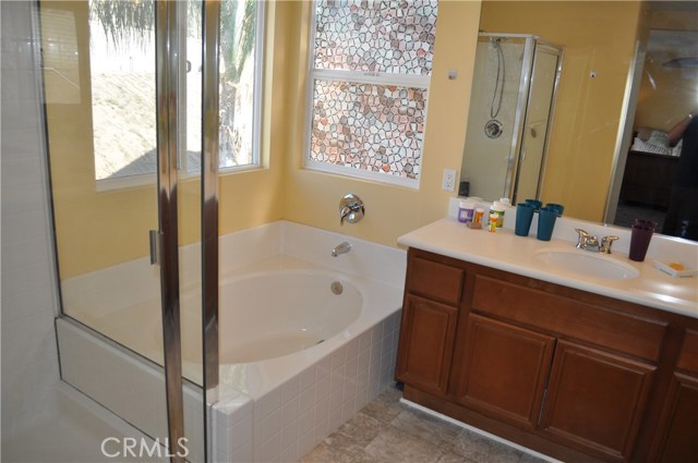 Full size tub, and shower in master bath.