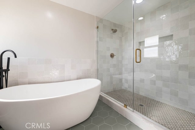 Huge shower with frameless door