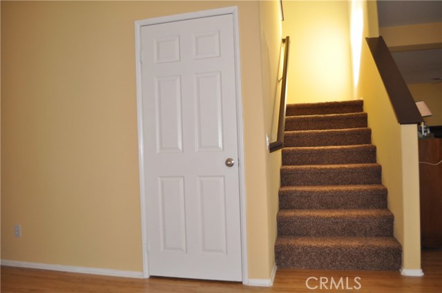 Extra storage under stairs.