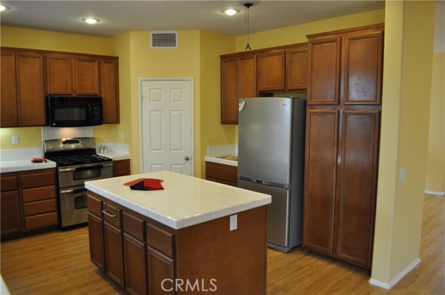 Kitchen with lots of storage and large pantry.