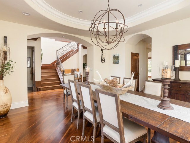 Formal dining, pantry, and staircase.