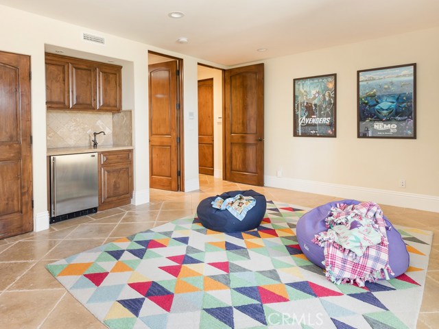 Wet bar area with fridge and ensuite.