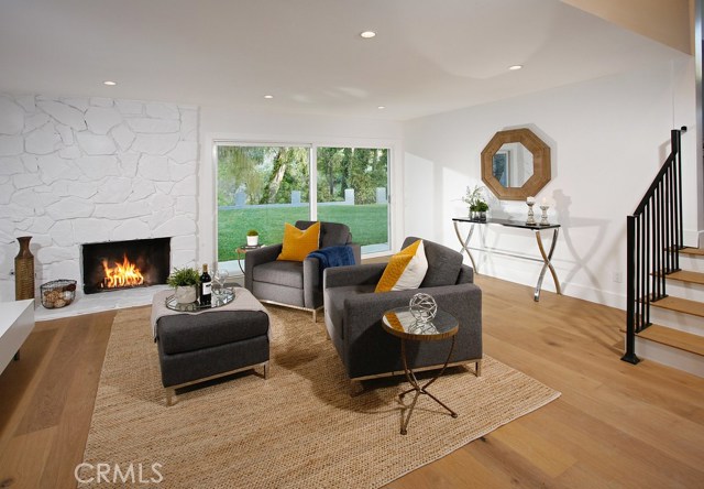 Family Room: -New recessed lights-New air vents-Kraft Maid cabinets with shaker doors-New Calacatta Translux quartz counter tops-New Matte Black Mirabelle bar faucet-New Kohler undermount bar sink-New Decora outlets and switches-New 6 inch base boards-New Copa Coast hardwood floor.