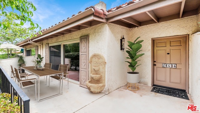 Exterior Front/Al Fresco Patio - Virtually Staged