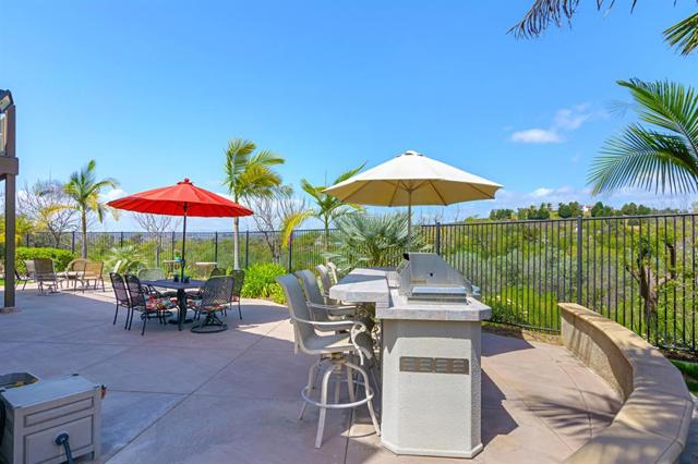 This back patio is the perfect area for entertaining, spending quiet time and enjoying time in your hot tub/spa! The View is FANTASTIC!