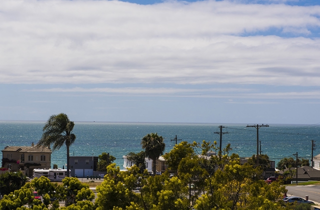 This is the amazing ocean view from this unit's access to the roof.