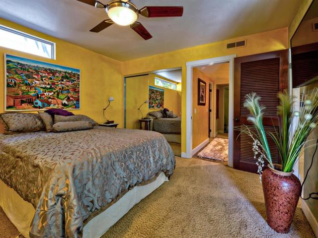 Bedroom suite. Ground floor. Has sliding glass doors to patio and yard.