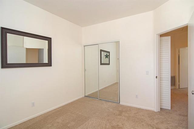 Mirrored Wardrobe Doors open up this room even more!