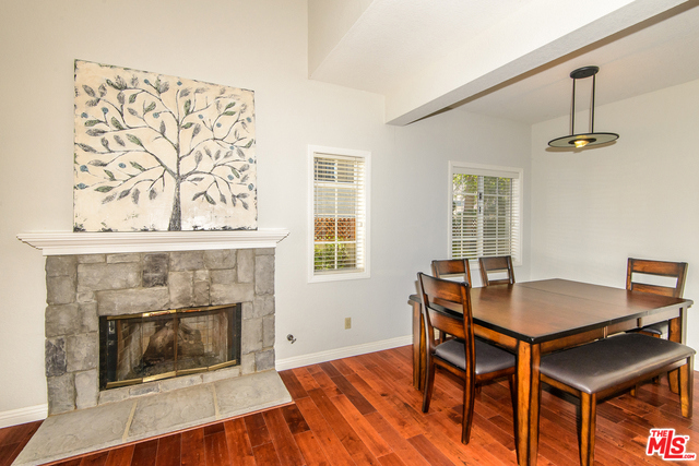 Cozy Fireplace in the Family Room, Open to the Din