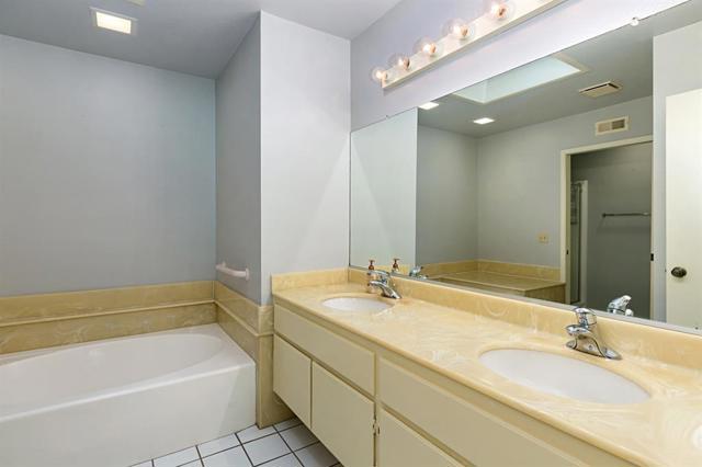 Master Bath has dual sinks and separate tub & shower