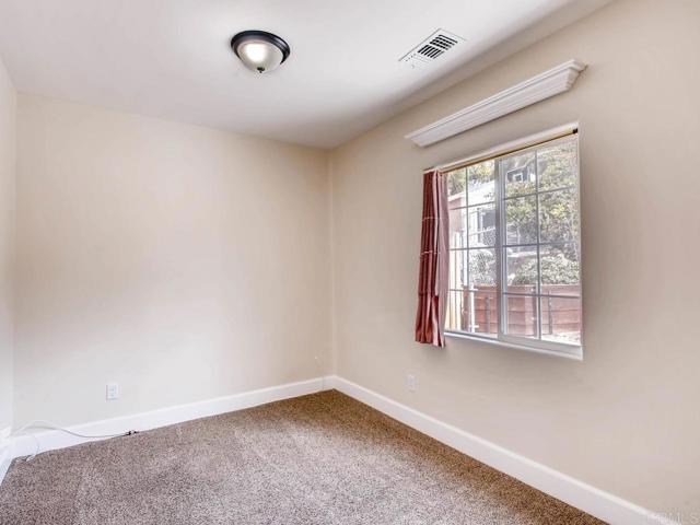 Downstairs second bedroom.