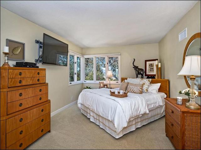 Secondary bedroom with en suite bathroom.