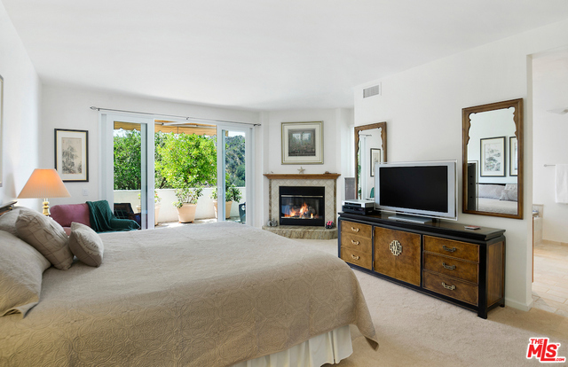 Master Bedroom with fireplace & sitting area