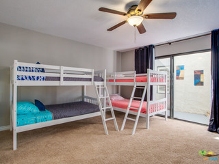 Second bedroom with large closet and slider to atrium