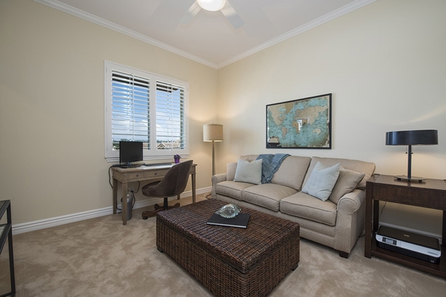 This is the third bedroom with nice views of the mountains to the East and a generous walk in closet.