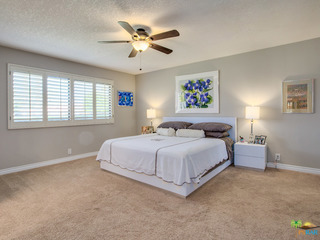 Large master bedroom with mountain views and walk-in closet