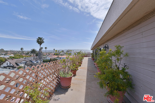 Wrap Around Balcony by Kitchen