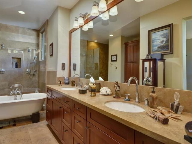 Double vanity. Lots of cabinets. Walk-in closet