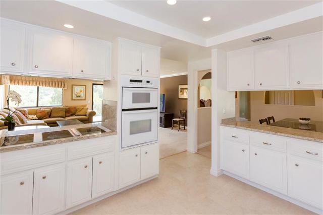 kitchen showing pass thru into old dining room