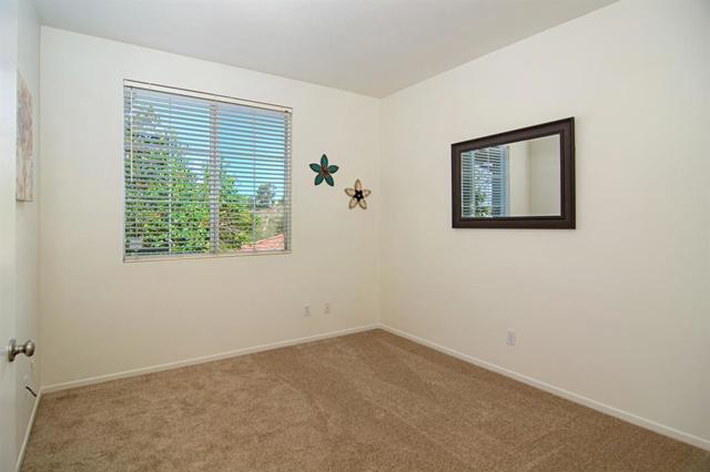 Oversized Second Bedroom boasts a Large Window for lots of Natural Light AND a High Ceiling!