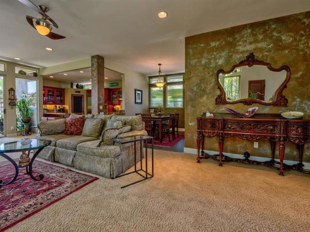 Beautiful open floor plan: living room, kitchen, dining room, patio