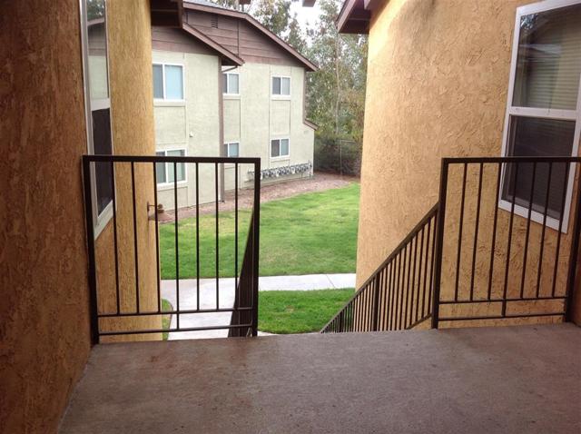 View from top of stairs looking on to green belt.