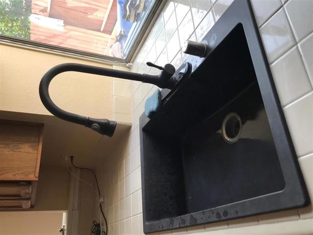 This is a brand new kitchen sink and faucet along with new tiles.  The owned is willing to give a $2,500 granite slab credit.