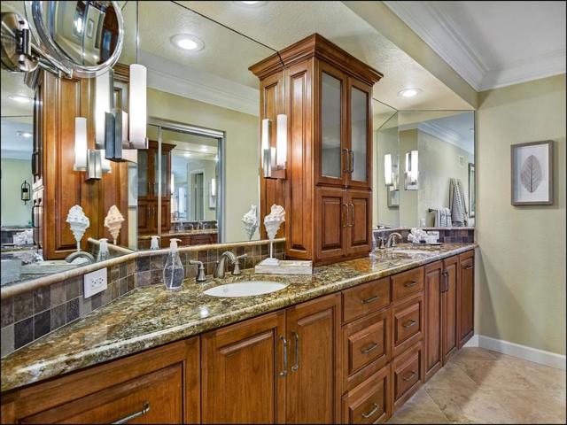 Large master bath with plenty of room for two.... You both have your own space!