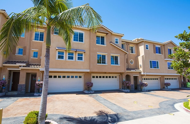 The entrance to 2744 Carlsbad Blvd #205 is facing East. The large 2 car garage comes with cabinets with plenty of room for your surfboards, beach cruisers, and sand toys.  This unit is a short walking distance from the Coaster and Amtrak Train.