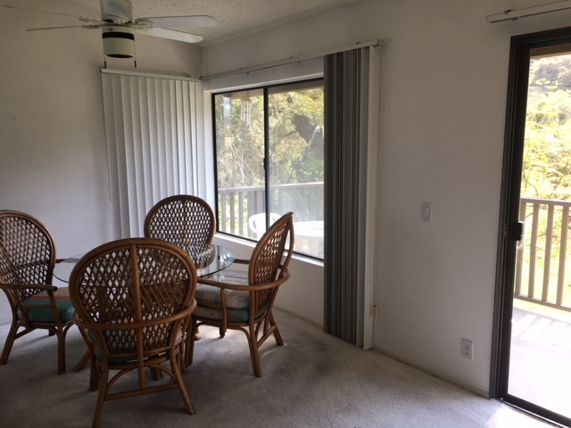 Dining area next to kitchen and living room. Views overlooking Balcony.