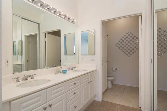 Dual Sinks with plenty of lighting! Opposite is a Large Walk-in Closet!