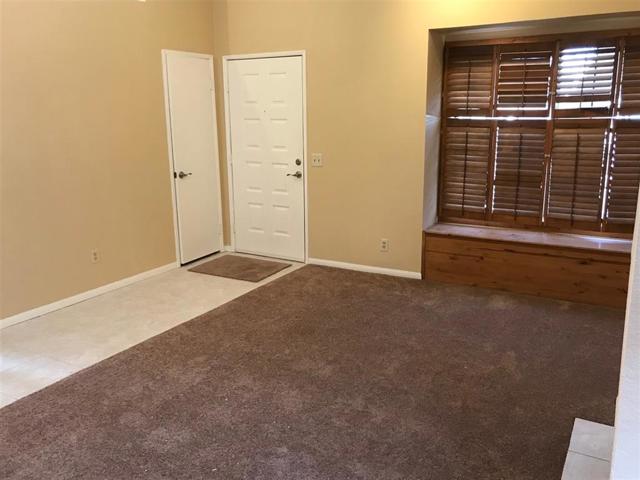 Entry way with fresh grout (in existing tile) for that clean new feeling. This tile extends all the way down the hallway right up to the bedroom doors.