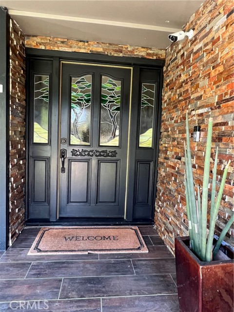 Front door with stone feature wall