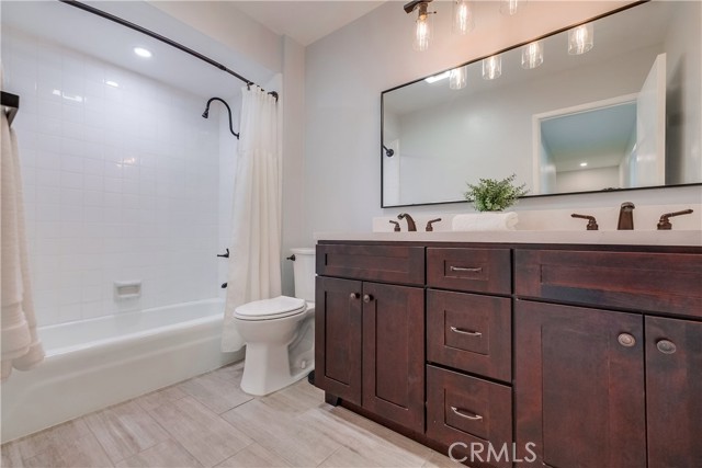 Full bathroom with double sinks secondary bathroom