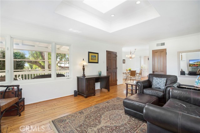 Light filled living room with skylight