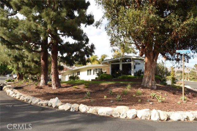 Super curb appeal, on an almost 10,000 sq. ft corner lot right near the coastline!