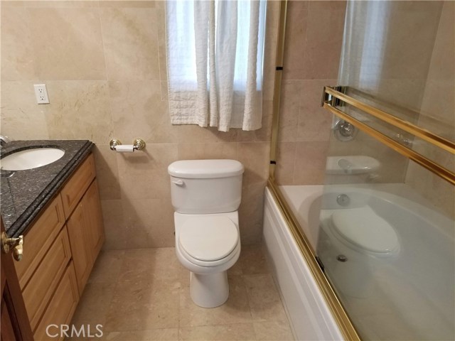 Full bath with double sinks