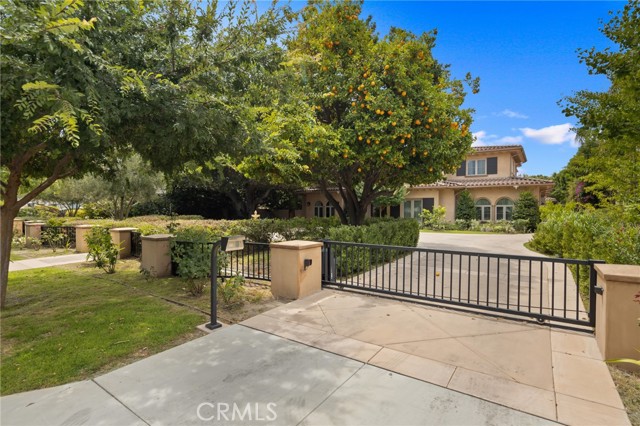 Long driveway to backyard and circular driveway in front