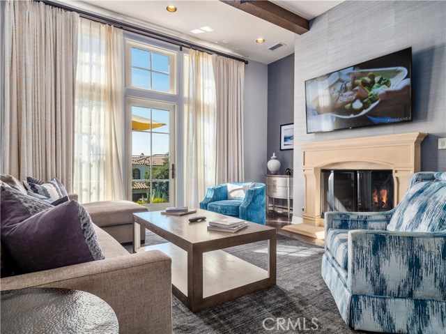 Sunlit great room leads to the outdoor patio.