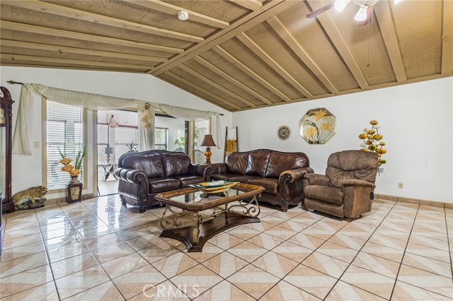 Large family room with vaulted ceilings.