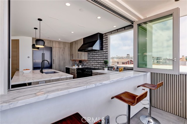 Passthrough from kitchen with dining bar