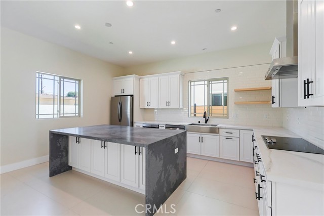 Detail Gallery Image 6 of 30 For 10347 Mapledale St, Bellflower,  CA 90706 - 4 Beds | 3 Baths