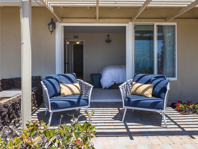 Patio outside primary suite.