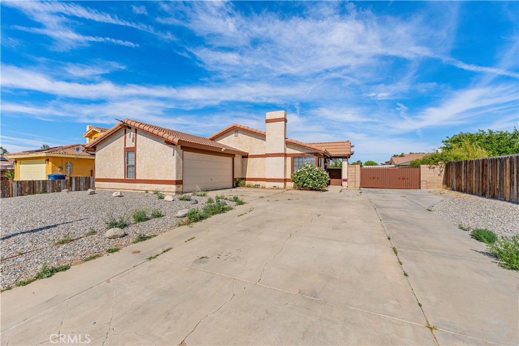 Beautifully maintained 2-bedroom, 2-bath home with excellent curb appeal and thoughtful details throughout. Enjoy a spacious driveway with RV access, a 2-car garage, and a clean, modern look with rock landscaping in front. The interior is bright, welcoming, and in exceptional condition—comfortable living without the need for updates. The backyard offers a great space to relax or entertain.