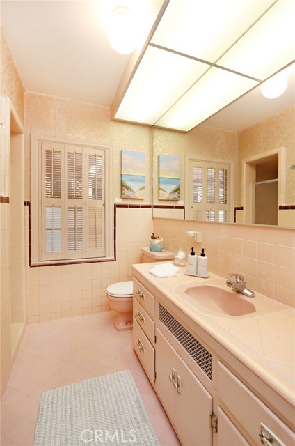 Front bathroom located off foyer, and between two front bedrooms