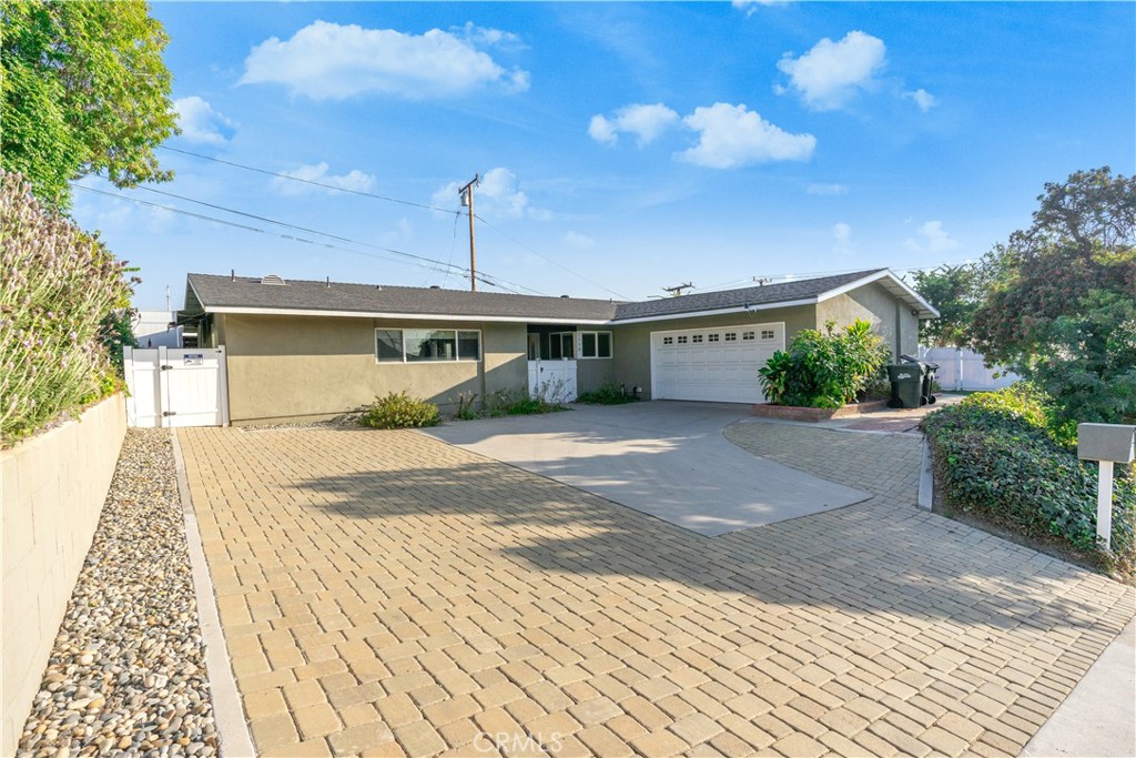 Welcome to 1590 Valley Vista Drive! Beautiful single-story pool home for sale in Monterey Park. This spacious 3 bedroom and 3 bath gem offers an open concept with 2 bedroom suites. Built in 1957, and remodeled in 2018, this home boasts approximately 1,662 square feet of living space on an 8,602SF lot. Other features include laminate flooring, granite countertops, stainless steel appliances, dual sinks in two bathrooms, washer, dryer, 2-car garage with direct access, fireplace, energy-efficient windows, central HVAC system, pool, and jacuzzi. The master suite includes a sizable walk-in closet and retreat sitting area. Additional amenities include space in the driveway for RV parking and an observation platform to take in the beautiful southern views.  Located in the Brightwood Elementary and Mark Keppel High School boundaries.
