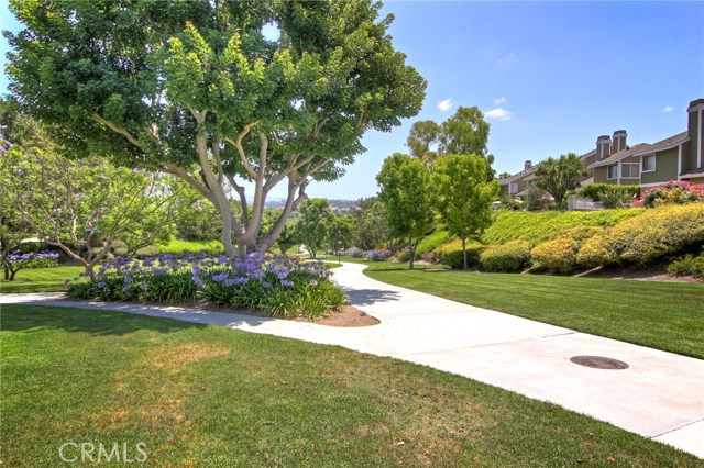 Neighborhood is criss crossed by shaded walkways. Enjoy morning or evening strolls along the many neighborhood green belts