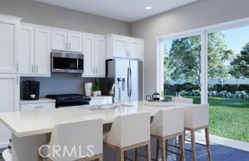 
* REPRESENTATIVE PHOTO. This beautiful kitchen opens right up to the family room so the chef won't miss out on a thing!
