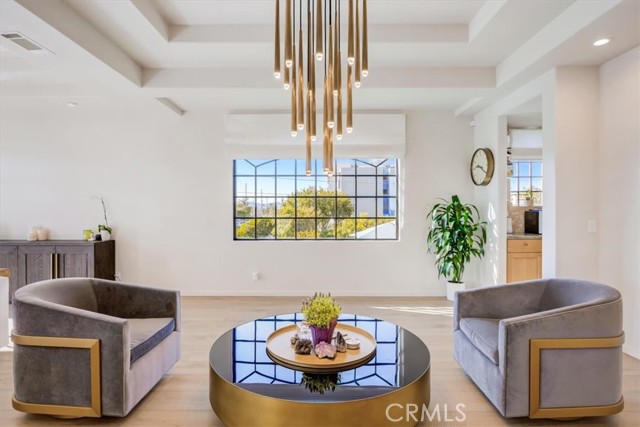 Wonderful bright sitting space off of the living room.  Could easily be used as a dining area and you could use the dining room as a separate office/play room etc...so many options here!