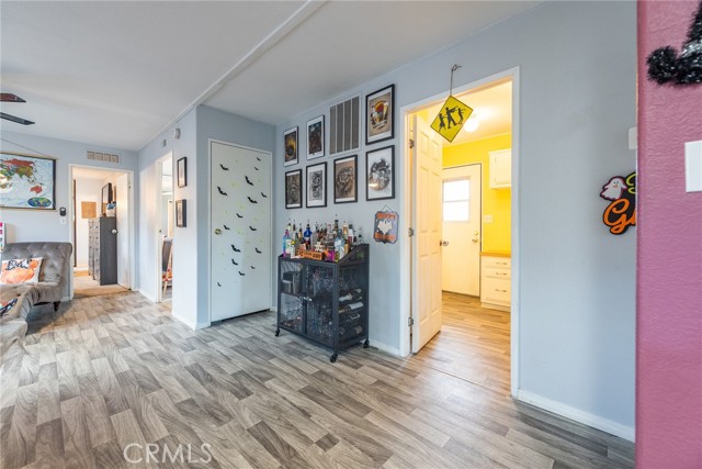 Vinyl flooring throughout except the bedrooms